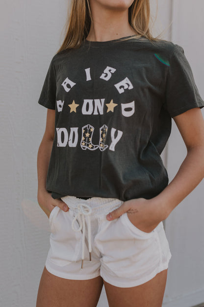 RAISED ON DOLLY GRAPHIC TEE